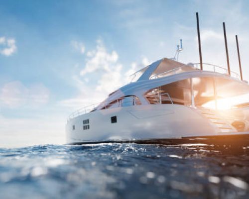 Catamaran motor yacht on the ocean at sunny day